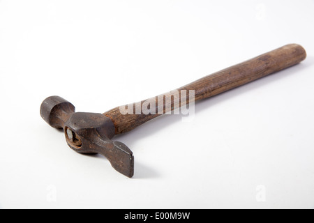 Old wooden engineers chipping hammer on a white studio background Stock Photo