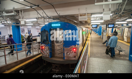 PATH trains at their 33rd Street terminal in midtown in New York Stock Photo