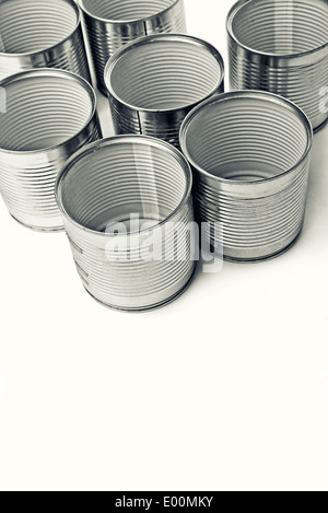 Empty Tin cans. Cans are used for packing all sorts of goods - conserved food, chemical products such as paint, etc Stock Photo