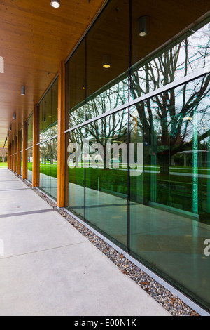 Reflective wall of glass panels on the campus of UBC, Vancouver, Canada Stock Photo