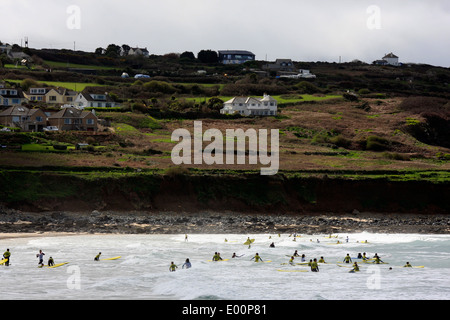 Surfers learning to surf at Porthmeor beach in St Ives in Cornwall Stock Photo