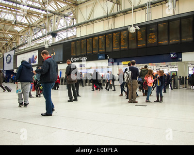 The main concourse and information boards of Waterloo station, London, England Stock Photo