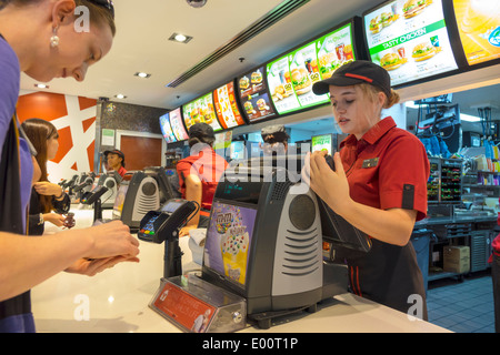 Sydney Australia,Circular Quay,McDonald's,burgers,hamburgers,restaurant restaurants food dining cafe,fast food,counter,customer,ordering,paying pays b Stock Photo