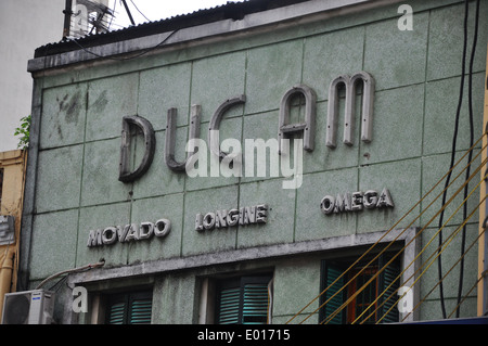 signage on old colonial building in Hanoi, vietnam Stock Photo