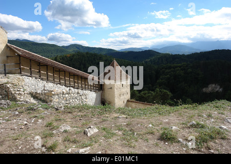 The wall and tower of old fortress Rasnov in Romania. Stock Photo