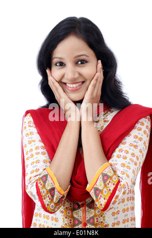 Excited young woman against white background Stock Photo