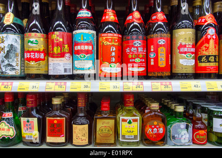 Bottles of rice wine in a supermarket in Hong Kong China Stock Photo