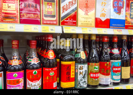 Bottles of rice wine in a supermarket in Hong Kong China Stock Photo