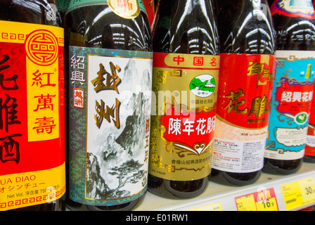 Bottles of rice wine in a supermarket in Hong Kong China Stock Photo