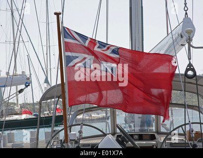 red ensign flag, sometimes referred to as a red duster, flying on a yacht in the Caribbean