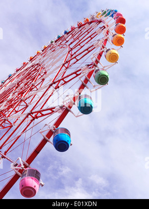 Giant Sky Wheel observation wheel with colorful gondolas in Palette town, Odaiba, Tokyo, Japan. Stock Photo