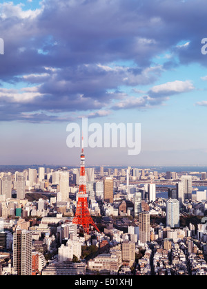 License available at MaximImages.com - Tokyo Tower under blue sky in city landscape aerial view. Tokyo, Japan. Stock Photo