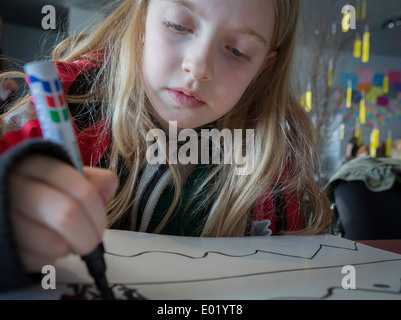 Child creating artwork during the annual Children's Festival in Reykjavik, Iceland Stock Photo