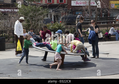 Children play & have fun together at the Vanderbilt Playground in Prospect Park, Brooklyn, NY. Stock Photo
