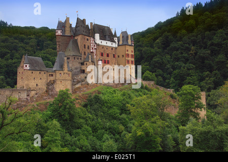 Burg Eltz Castle, located between Koblenz and Trier, Germany, is situated on a rock in the middle of the valley of the Moselle R Stock Photo