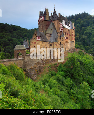 Burg Eltz Castle, located between Koblenz and Trier, Germany, is situated on a rock in the middle of the valley of the Moselle R Stock Photo