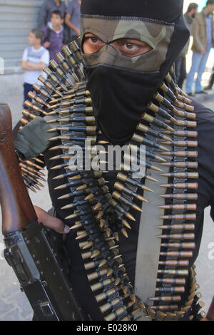 Gaza. 29th Apr, 2014. A Palestinian militant from the Popular Front for the Liberation of Palestine (PFLP) takes part in a military parade in the southern Gaza Strip City of Khan Yunis on April 29, 2014. Credit:  Khaled Omar/Xinhua/Alamy Live News Stock Photo