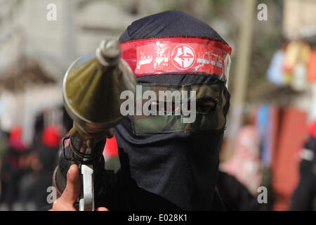 Gaza. 29th Apr, 2014. A Palestinian militant from the Popular Front for the Liberation of Palestine (PFLP) takes part in a military parade in the southern Gaza Strip City of Khan Yunis on April 29, 2014. Credit:  Khaled Omar/Xinhua/Alamy Live News Stock Photo