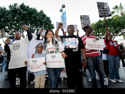 Los Angeles, California, USA. 29th Apr, 2014. A coalition of activists, civil rights groups and Angelenos of all races and ethnicities gather for the ''Los Angeles is Better than Donald Sterling Anti-Racism Rally'' outside Staples Center to protest the blatantly racist comments made by Los Angeles Clippers owner, Donald Sterling. Earlier in the day, National Basketball Association Commisioner Adam Silver announced at a news conference that he had banned Sterling for life from the NBA. Credit:  ZUMA Press, Inc./Alamy Live News Stock Photo