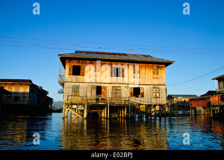 A floating house built on stilts at Inle Lake. Stock Photo