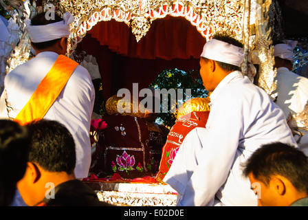 Four main Buddha images on procession on route to the next village Stock Photo