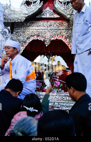 Four main Buddha images on procession on route to the next village Stock Photo