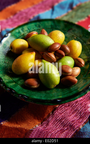 Fresh Argan nuts (Argania spinosa), peeled and unpeeled Stock Photo