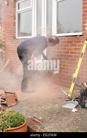A window fitter using a disc cutter Stock Photo