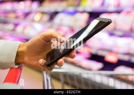 Female store cell phone close-up Stock Photo
