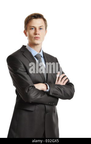 Young handsome businessman in black suit and tie isolated on white background Stock Photo