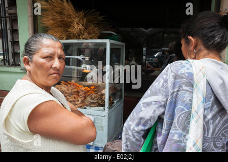 Guatemala City, Guatemala. 15th Mar, 2013. Women buying baked goods in Zona 1. © Alena Kuzub/ZUMA Wire/ZUMAPRESS.com/Alamy Live News Stock Photo