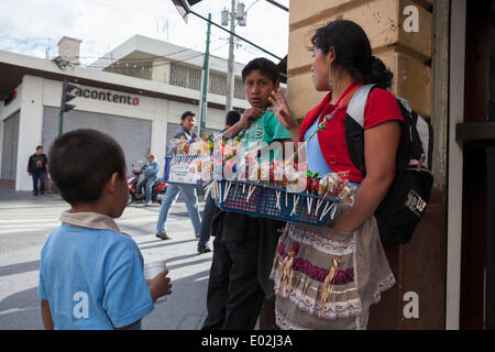 Guatemala City, Guatemala. 15th Mar, 2013. Street vendors talk on the corner of a street. © Alena Kuzub/ZUMA Wire/ZUMAPRESS.com/Alamy Live News Stock Photo