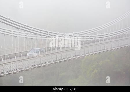 Bristol, UK. 30th Apr, 2014. Clifton Suspension Bridge disappears into the fog as commuters make their way to work in Bristol. The Met Office issued a yellow weather warning for southern England and Wales due to dense fog - which has led to disruption of morning flights in London and Bristol. 30 April 2014 Credit:  Adam Gasson/Alamy Live News