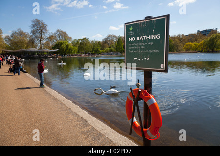 No bathing sign with lifebouy by Serpentine in Hyde Park. Stock Photo