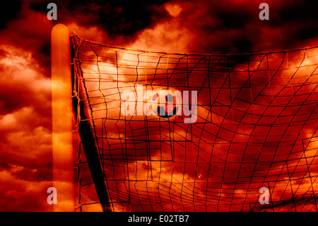 soccer ball in the net, goal scoring Stock Photo