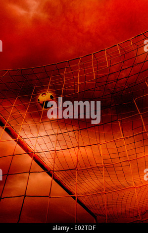 soccer ball in the net, goal scoring Stock Photo