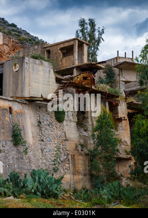 Old abandoned quarry ruins in Greece Stock Photo