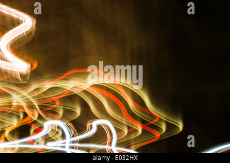 An abstract random pattern of lights caused by movement during a long exposure. Stock Photo