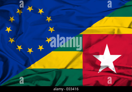 Waving flag of Togo and EU Stock Photo