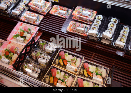 Packaged sushi rolls, prepared food on display in a Japanese supermarket. Tokyo, Japan.