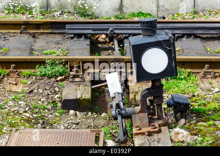 Hand-operated railroad switch with lever, weight and signal Stock Photo ...