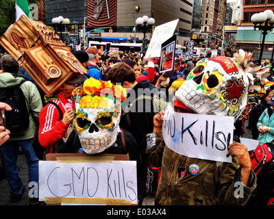 New York City Demonstration against GMO foods, Day of the Dead masks, GMO KIlls Stock Photo
