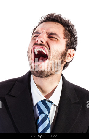 a young and handsome businessman in crying over a white background Stock Photo