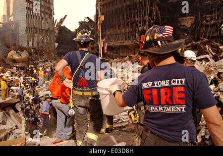 Urban Search and Rescue continue recovery of victims amongst the wreckage of the World Trade Center in the aftermath of a massive terrorist attack which destroyed the twin towers killing 2,606 people September 19, 2001 in New York, NY. Stock Photo