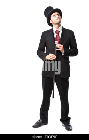 Businessman with Top Hat and walking stick in a suite Stock Photo