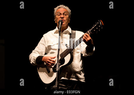 Turin, Italy. 30th Apr, 2014. Caetano Veloso, a very famous Brazilian singer and composer, a contributor with Gilberto Gil to the explosion of the 'Tropicalismo', cultural and music movement of the sixties, performs live in Castle Square of Turin during the Jazz Festival.  Credit:  Andrea Gattino/Pacific Press/Alamy Live News Stock Photo