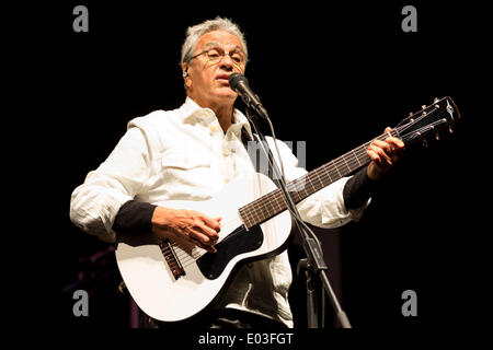 Turin, Italy. 30th Apr, 2014. Caetano Veloso, a very famous Brazilian singer and composer, a contributor with Gilberto Gil to the explosion of the 'Tropicalismo', cultural and music movement of the sixties, performs live in Castle Square of Turin during the Jazz Festival.  Credit:  Andrea Gattino/Pacific Press/Alamy Live News Stock Photo