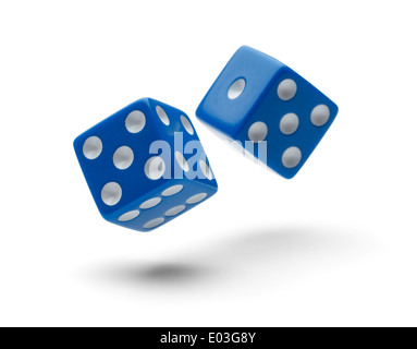 Two Dice Rolling through the Air Isolated on White Background with Shadows. Stock Photo