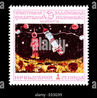 Postage stamp from Bulgaria depicting a children's drawing of cosmic research for peaceful purposes. Stock Photo