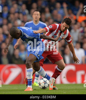 London, UK. 30th Apr, 2014. Chelsea's midfielder Ramires and Athletico Madrid's midfielder Koke compete for the ball during the UEFA Champions League Semi-Final match between Chelsea from England and Athletico Madrid from Spain played at Stamford Bridge, on April 30, 2014 in London, England. Credit:  Mitchell Gunn/ESPA/Alamy Live News Stock Photo